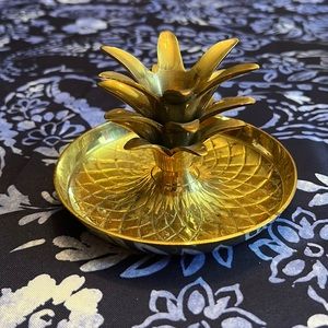 Solid brass pineapple candleholder. Holds a taper candle.